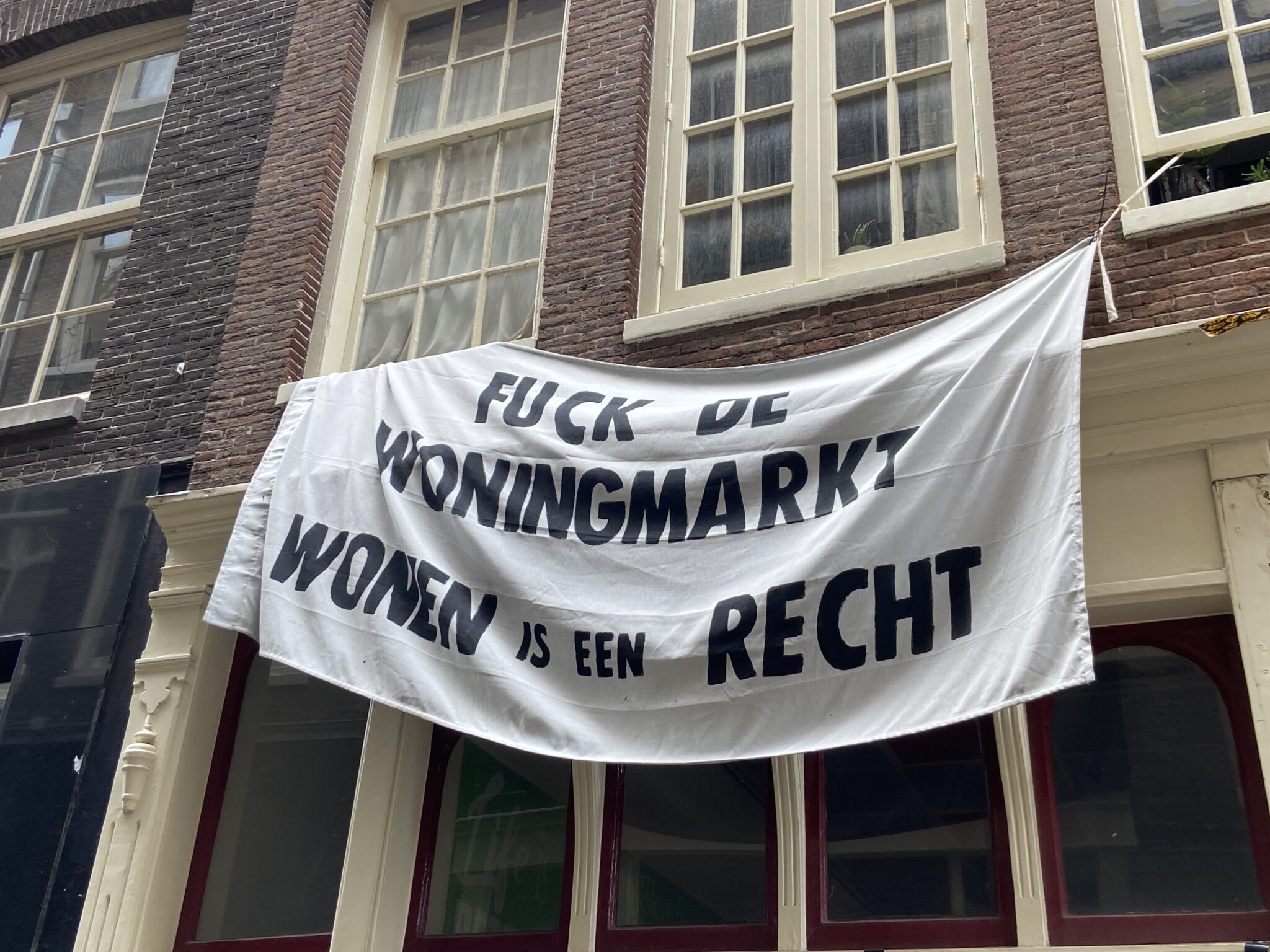 using-market-protest-banner-in-Amsterdam-2048x1536.jpg