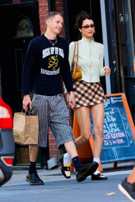 bella-hadid-displays-her-slender-legs-in-checkered-mini-skirt-while-out-with-boyfriend-marc-ka...jpg