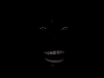 Negro riéndose enla oscuridad video ;v.jpeg