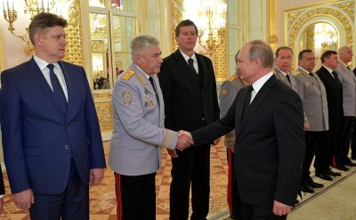 1280px-Vladimir_Putin_with_military_people_(2018-10-25)_07.jpg