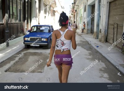 stock-photo-a-local-women-in-the-street-of-havana-cuba-664767976.jpg
