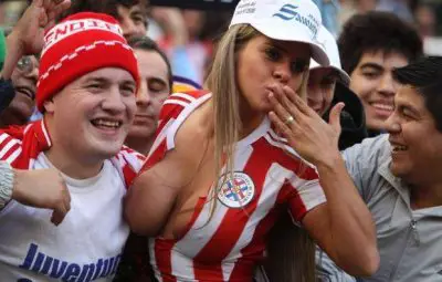 Paraguayan model Javy poses with fans in the tribune at the Copa ___.jpg