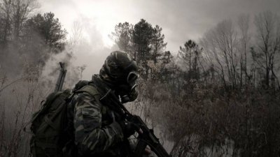 4593787-soldier-gas-masks-trees-military-apocalyptic-weapon.jpg