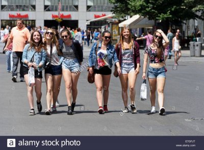 a-group-of-teenage-friends-walking-along-the-wenceslas-square-prague-E7GFJT.jpg