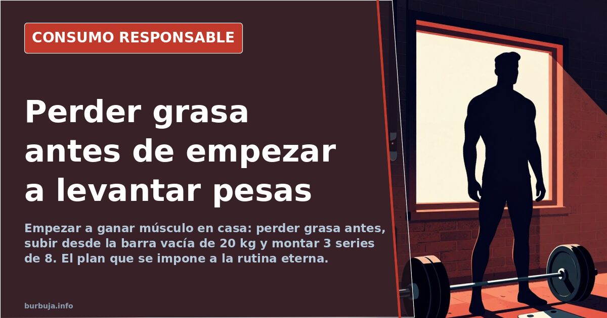 Par de mancuernas y banco de entrenamiento en una habitación, material básico para empezar a ganar músculo en casa