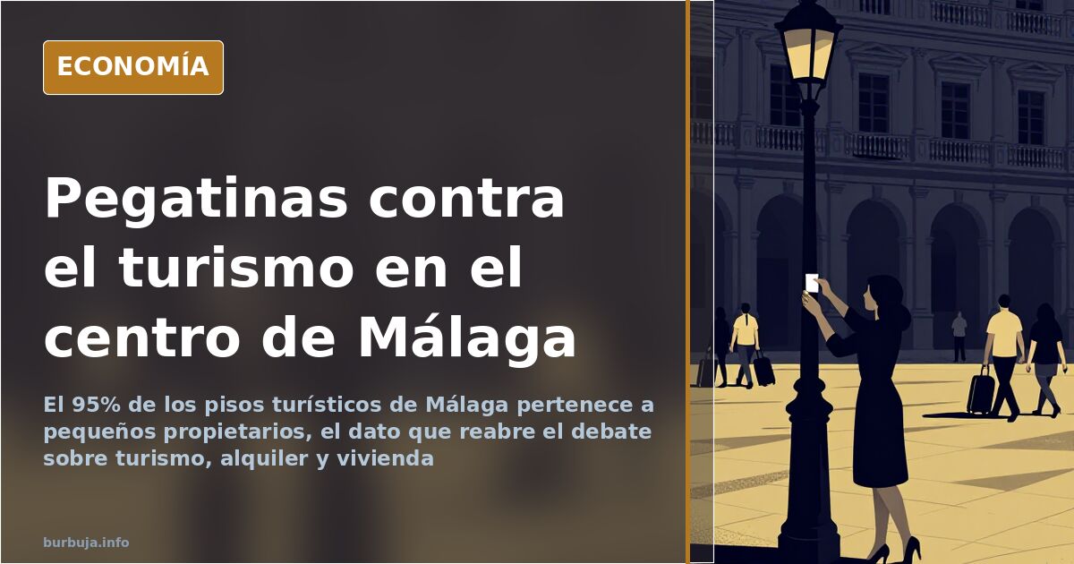Fachada de un edificio del centro de Málaga con placa de apartamento turístico y una pegatina reivindicativa en la puerta