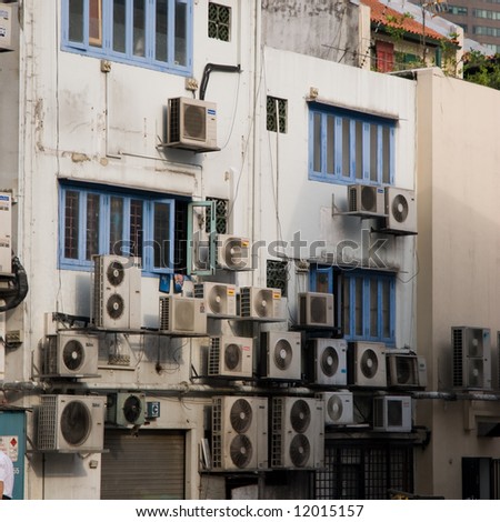 stock-photo-multiple-air-conditioner-at-the-backside-of-a-street-in-singapore-12015157.jpg
