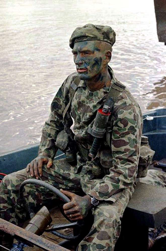 A-member-of-U.S.-Navy-Seal-Team-shown-in-a-converted-mike-boat-as.jpg