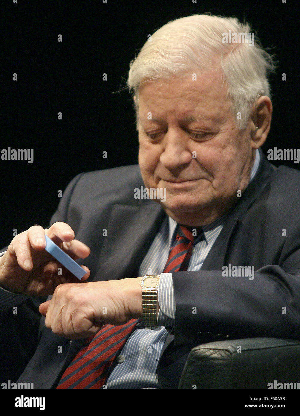 former-chancellor-helmut-schmidt-puts-snuff-tobacco-on-his-hand-during-F60A5B.jpg