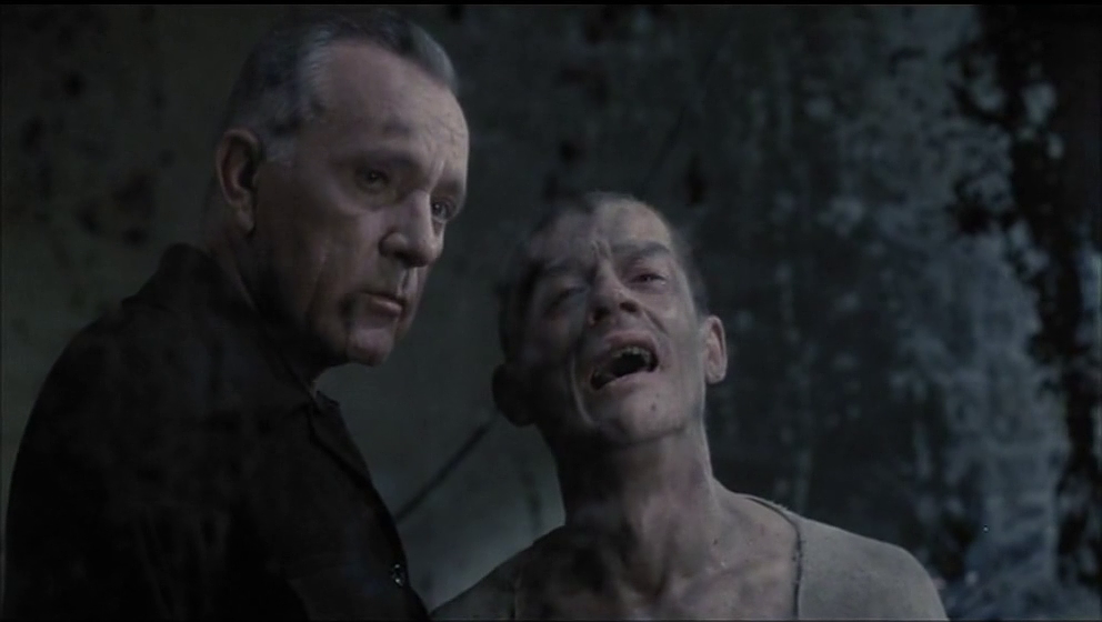 nineteen-eighty-four-17-obrien-forces-winston-to-look-at-his-deteriorated-self-in-an-old-and-pockmarked-mirror.png